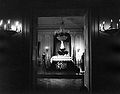 The remains of John F. Kennedy lying in repose in the East Room of the White House, 1963.