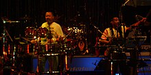 Johnson, left, performing with Earth Wind and Fire in 2007