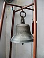 The retired church bell. The inscription reads "China Methodism" (中華基督教衛理公會).