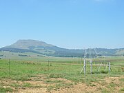 Majuba Hill seen from Laing's Nek; buildings on the right include the museum.