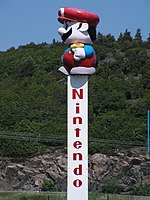 Statue of Super Mario on a Nintendo sign