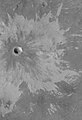 Bright rays caused by impact throwing out a bright lower layer. Some bright layers contain hydrated minerals. Picture taken with Mars Global Surveyor. Location is Memnonia quadrangle.