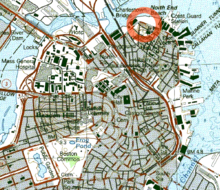 A scanned colour map. The area around North End Beach and Charlestown Bridge is circled in red.