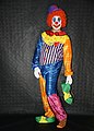 A man dressed in clown costume