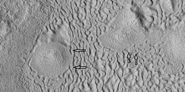 Brain terrain being formed, as seen by HiRISE under HiWish program. Note: this is an enlargement of the previous image using HiView. Arrows indicate spots where brain terrain is beginning to form.