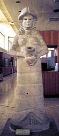 Life-sized statue of a goddess, probably Ishtar, holding a vase from Mari, Syria (eighteenth century BCE)