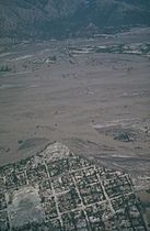 Lahars from Pinatubo volcano fill the broad Santo Tomás River valley SW of the volcano