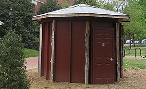 A freestanding room-sized camera obscura at the University of North Carolina at Chapel Hill. A pinhole can be seen to the left of the door.