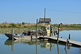 Flat bottomed oyster-boat with oyster-bags in Chaillevette, France