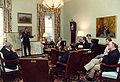 General Colin Powell briefs then U.S. President George H. W. Bush and his advisors on the progress of the ground war.