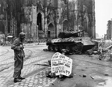 US soldier and destroyed Panther tank, 4 April 1945.