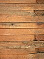 Stacked plank construction in Wildfell, a historic home in Darlington, Maryland. Stacked board construction is similar but with thinner lumber.