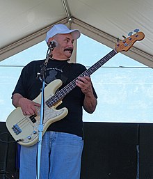 Estrada playing bass guitar 2006