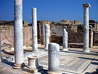 The peristyle impluvium with columns in the Ionic style and floor mosaic