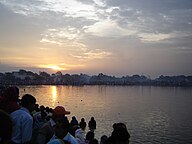 On the second day of Chhat devotees pay tribute to the rising Sun at Kathmandu, Nepal