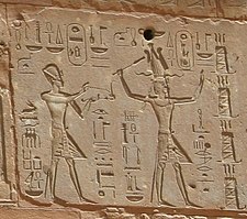 Hieroglyphs showing Thutmose III on the left and Hatshepsut on the right, she having the trappings of the greater role — Red Chapel, Karnak