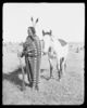 a photograph of Chief Crow Dog and horse