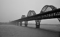 The Jiujiang Yangtze River Bridge is an arch bridge that was completed in 1992.