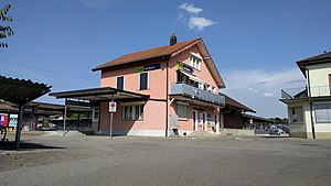 Two-story building with gabled roof