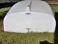 Flat transom on a dinghy with mount points for a rudder.