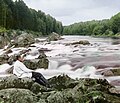 Portrait of Prokudin-Gorskii near Kivach Falls, Suna River. 1915