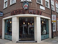 A Caffè Nero shop on a street corner in York