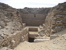 A Descending passage in the midst of ruined walls