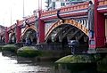 Image 3Vauxhall Bridge across the River Thames opened in 1906 and features sculptures by F. W. Pomeroy.