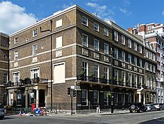 20-21 Portman Square, built by James and Samuel Wyatt. The white panels are Coade Stone. (See "Portman Square")