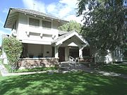 The Robert Scott House was built in 1909 and is located at 2230 E. Grandview St. in Mesa. The residence belonged to Robert Scott, a wealthy Mesa sheep farmer and large landowner, who was a co-founder of the Salt River Bank. The Scott House originally stood within the original Mesa townsite on the corner of First and Sirrine Streets, and when completed was among the few large formal residences in Mesa. Commercial expansion and downtown redevelopment projects during the past twenty years have changed the character of the townsite area. The original site of the Scott House was sold for commercial development in 1972, and the house was subsequently moved six miles to a residential subdivision where it is now located. The property was listed in the National Register of Historic Places on July 8, 1982, reference #82002079.