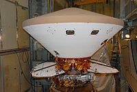 On Launch Pad 17-A at Cape Canaveral Air Force Station, the Phoenix Mars Lander waits for the fairing installation. NASA/George Shelton