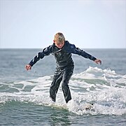 Beginner surfer in Pacific Beach, California