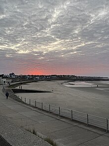 A picture of West Bay, Westgate at sunset looking West