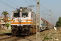 Lucknow AC being hauled by a Ghaziabad-based WAP-5 with LHB rake on first run