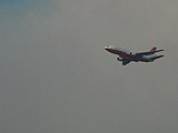 A DC-10 VLAT fights the fire from above.