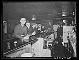 Dick's images of Pennsylvania mining towns, including this one of a bar in Gilberton (also dated "1938?"), focus on everyday activities, household living and items, and the mines themselves.