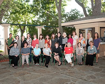 2012 gathering of current and past female NASA astronauts at Villa Capri near Johnson Space Center. Seated (from left): Carolyn Huntoon (JSC's first female director), Ellen Baker, Mary Cleave, Rhea Seddon, Anna Fisher, Shannon Lucid, Ellen Ochoa, Sandra Magnus Standing (from left): Jeanette Epps, Mary Ellen Weber, Marsha Ivins, Tracy Caldwell Dyson, Bonnie Dunbar, Tammy Jernigan, Cady Coleman, Janet Kavandi, Serena Auñón, Kate Rubins, Stephanie Wilson, Dottie Metcalf-Lindenburger, Megan McArthur, Karen Nyberg, Lisa Nowak