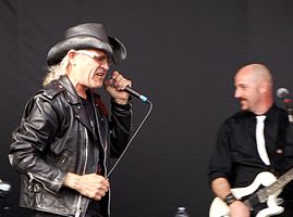 Men Without Hats performing in 2011 (Ivan Doroschuk, vocals; James Love, guitar)