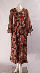 A vintage maxi dress from the 1970s featuring bell sleeves.