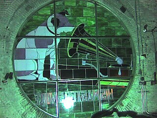 One of 4 Nipper stained glass windows seen from inside the "Nipper Tower" in the old RCA Victor Building 17[77]