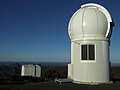 The SkyMapper telescope and the Advanced Technology Telescope in the background