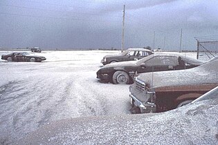 Snow-like ashfall caused by heavy rain mixing with ash columns