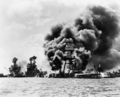 Aftermath: USS West Virginia (severely damaged), USS Tennessee (damaged), and the USS Arizona (sunk).