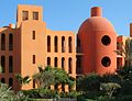 In the architectural design of Steigenberger Hotel in El Gouna Egypt, the minimalist design with 3-D geometric composition, and monochromatic coloring scheme provides graphical compositions from various angles