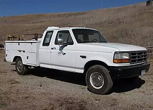 Ford F-250 extended cab fitted with an aftermarket utility bed