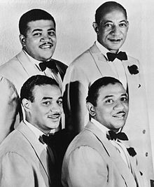 The Mills Brothers in 1944. Clockwise from the top-left: Harry Mills, John Mills, Donald Mills, Herbert Mills