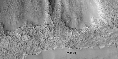 Close view that displays the thickness of the mantle, as seen by HiRISE under HiWish program. Location is Ismenius Lacus quadrangle.