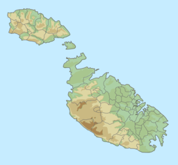 Map of the Maltese archipelago with a red dot on the south east coast of the island of Malta showing the location of St Thomas' Bay.