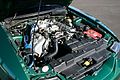 1999 SVT Cobra engine with a modified intake and battery.