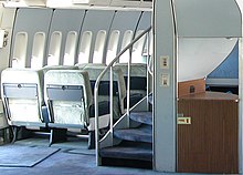 A helical staircase on 747-100s and −200s that leads to the upper deck